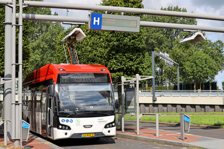 White and red city bus run by EBS in Zoetermeer the Netherlandsのeditorial素材
