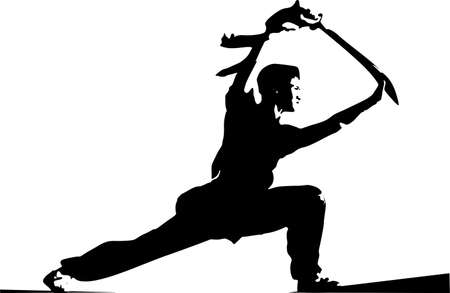 Young man doing karate with a weapon.の写真素材