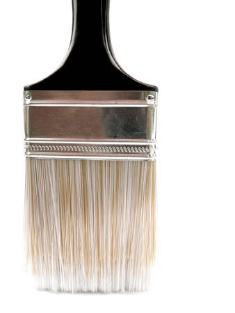 Brand new paint brush standing up with a white background.の写真素材