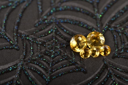 shiney orange gems on a spider web backgroundの写真素材