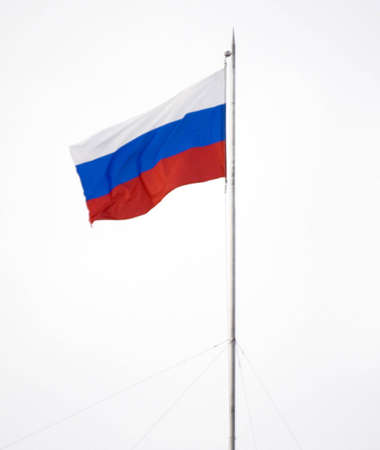 Russian flag waving on flagstaff isolatedの写真素材