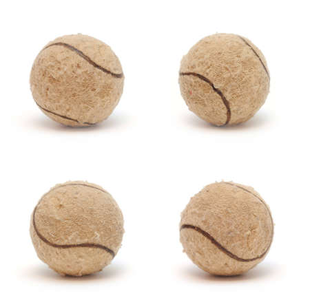 Four tennis balls collage isolated on white backgroundの写真素材