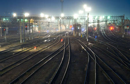 Railroad tracks at nightの写真素材