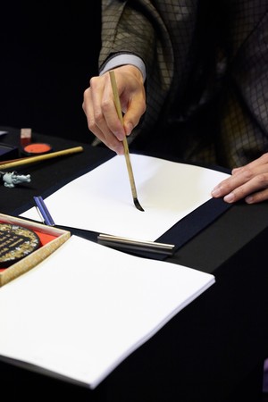 chinese painting and calligraphy on white paperの写真素材