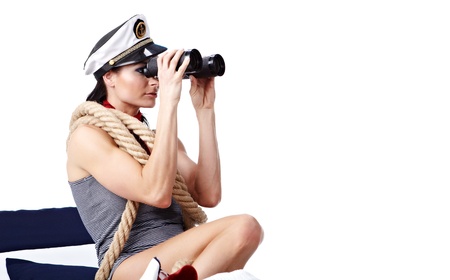 Woman looking through binoculars isolated on white