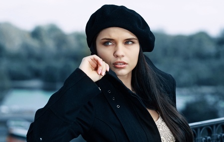 Beautiful young woman in a cityの写真素材