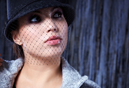 Fashion Beautiful Woman over grey background 