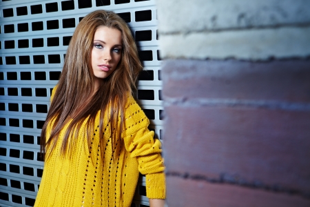 young brunette woman portrait in autumn color の写真素材