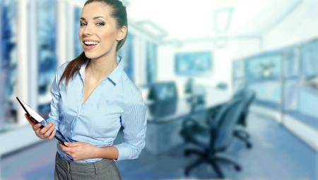 A portrait of a young business woman in an officeの写真素材