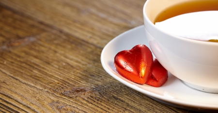 Cup of tea with lemon on the wooden table の写真素材