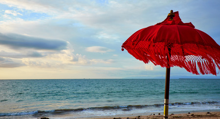 Red beach umbrella . Tropical paradise .の写真素材