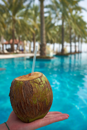Coconut water to drink by the poolの写真素材
