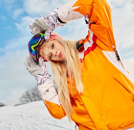 Portrait of young beautiful woman on winter outdoor