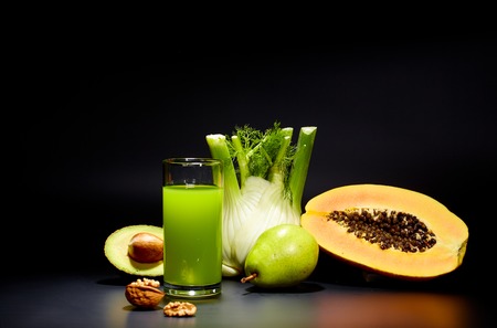 healthy vegetable juices for refreshment and as an antioxidant . Black backgroundの写真素材