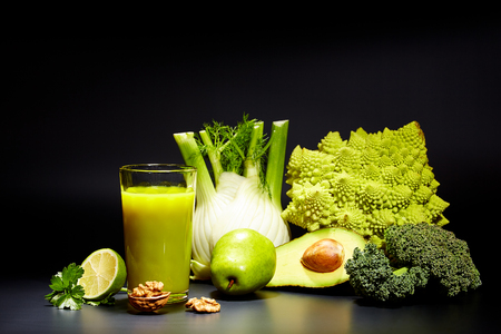healthy vegetable juices for refreshment and as an antioxidant . Black backgroundの写真素材