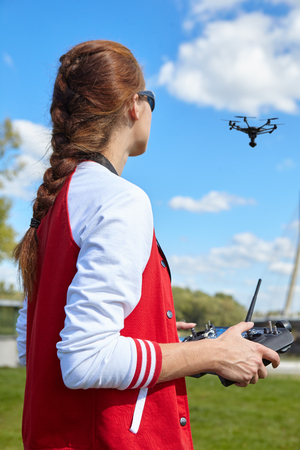 Woman playing with drone