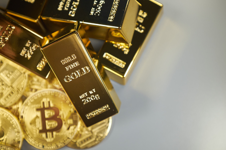 Golden Bitcoin Coin and gold.の写真素材