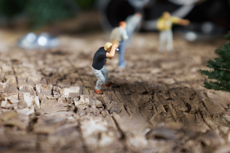 Miniature people photographer : shooting  a Retro, old, vintage and classic film cameraの写真素材