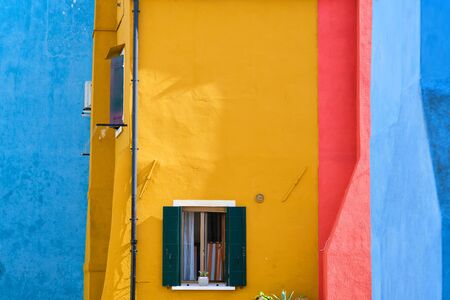 Abstract colorful walls and windows of the old houses. Copy spaceの写真素材