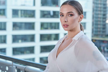 Beautiful businesswoman outdoor. Property office agentの写真素材