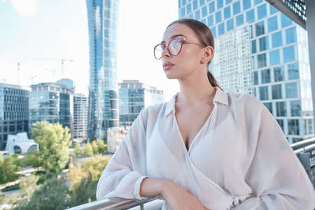 Beautiful businesswoman outdoor. Property office agentの写真素材