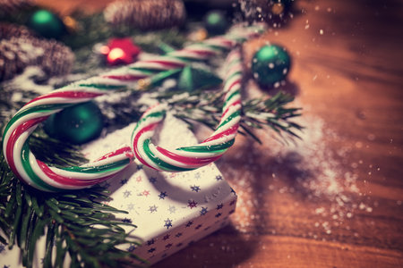 Christmas wooden background with snow fir tree. View with copy spaceの写真素材