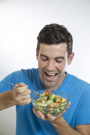 man holding saladの写真素材