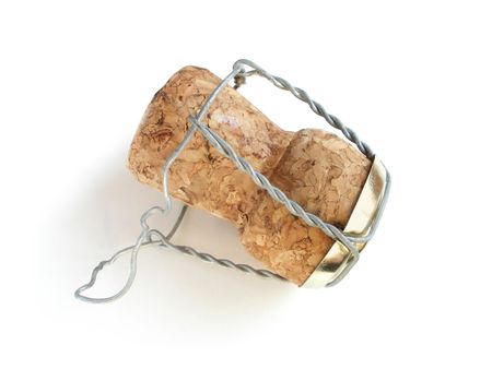 Champagne cork over white backgroundの写真素材