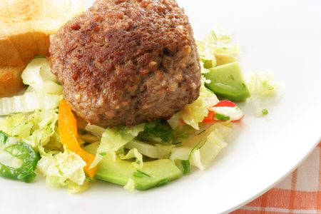 Cutlet and fresh vegetable salad cllose-up