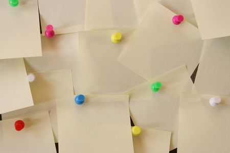 Lots of blank notes attached to a wallの写真素材