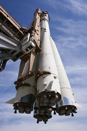 Space rocket at a cosmodrome aganst a blue sky