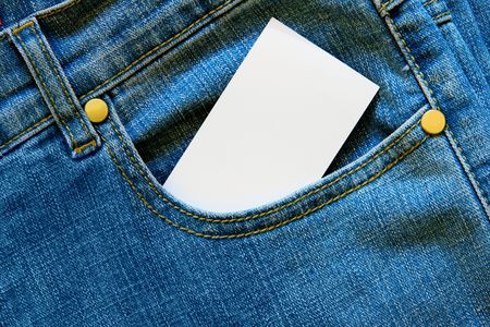 Blank calling card in blue jeans pocketの写真素材