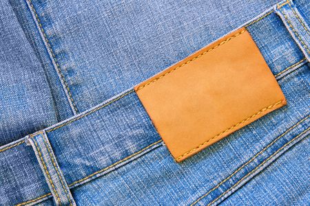 Blue jeans with blank label for your own text