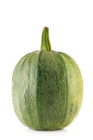 Green ripe pumpkin isolated over a white backgroundの写真素材