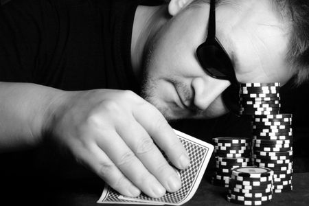 Poker gambler close-up. Black and white image.の写真素材