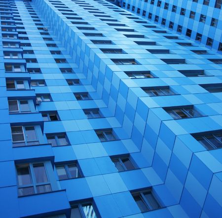 Wall of modern multistory residential construction close-up 
