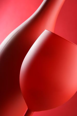 Red wine bottle and glass close-upの写真素材