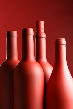 Still-life with lots of red wine bottlesの写真素材