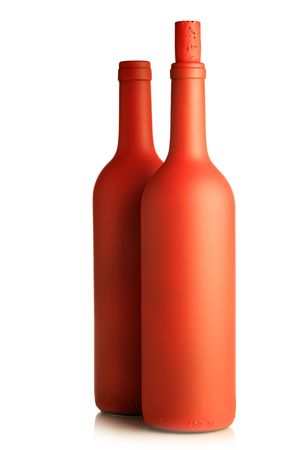 Red bottles cilose-up isolated over white の写真素材