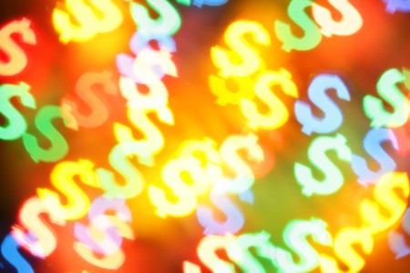 Colorful blurred dollar symbols, may be used as backgroundの写真素材