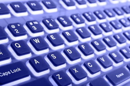Keyboard close-up toned in blue color