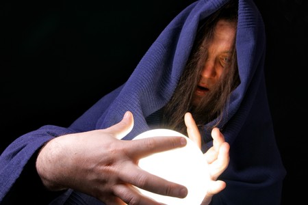 Wizard with glowing magical orb close-upの写真素材