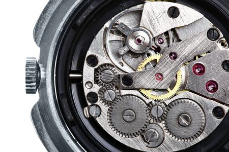 Clockwork of wristwatch isolated over white background