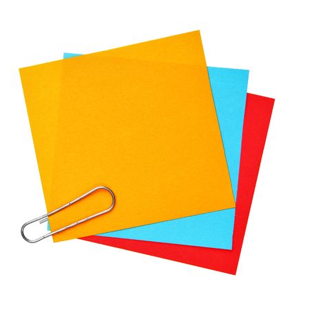 Blank colorful papers with clip isolated over white background
