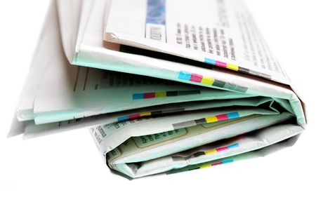 Newspaper close-up isolated over white background