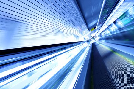 Escalator in motion at modern business center