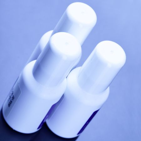 Three spray cans with drugs close up