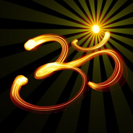 Sacred Om syllable created by light with raysの写真素材