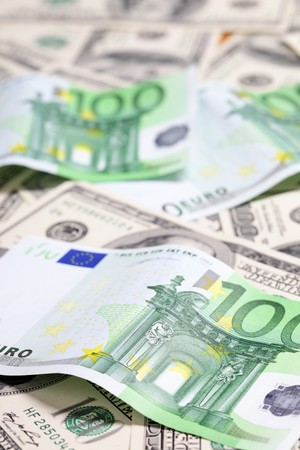 Euro and dollar banknotes, may be used as background. Shallow DOF!の写真素材