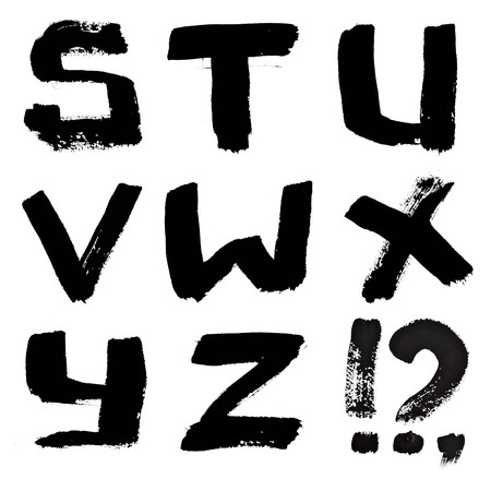 Hand written black ink alphabet over the white backgroundの写真素材